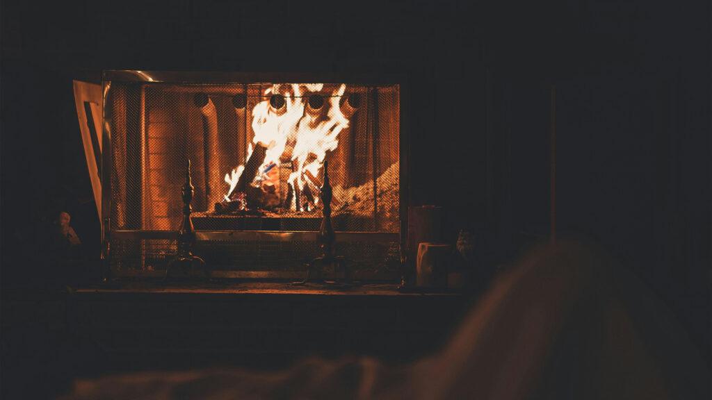 Living room in a Northern Idaho home showcasing a fireplace as part of an HVAC system, providing warmth and comfort in a cozy setting.