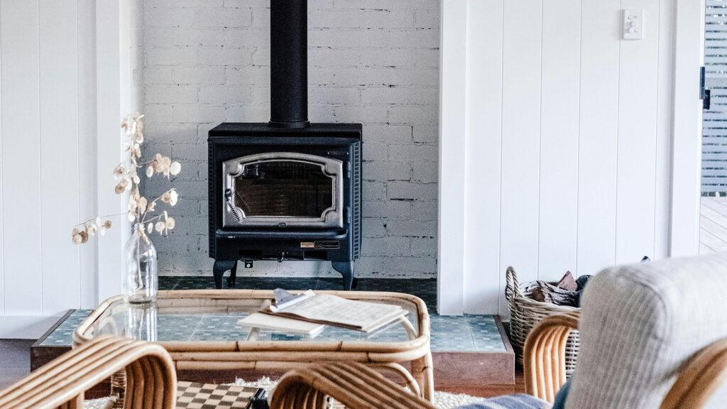 Wood stove in a contemporary home providing warmth and a rustic touch during the winter season.